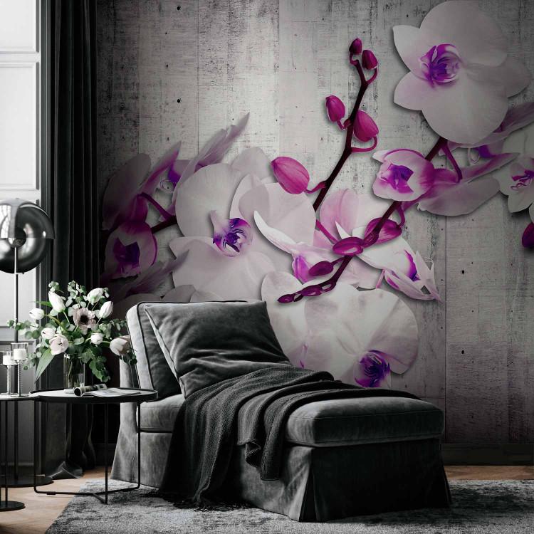 Wall Mural White orchids with purple accent - flower motif on concrete background