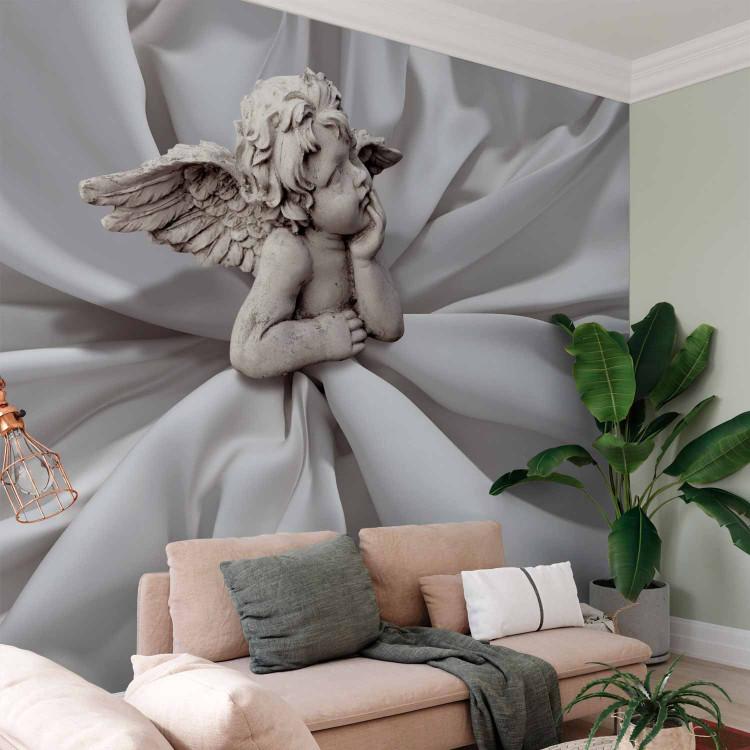 Wall Mural Angelic romantic dream - angel cupid sculpture amid white fabric