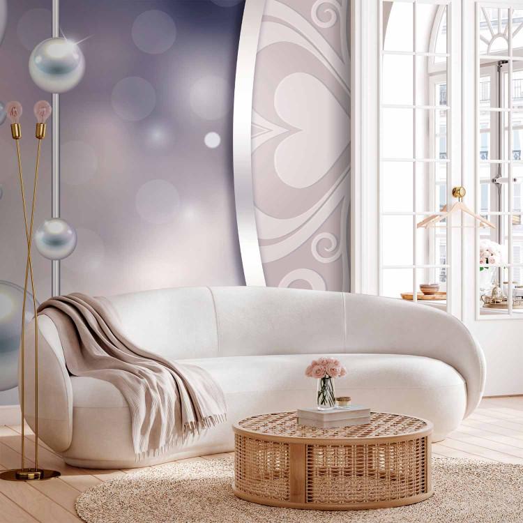 Wall Mural Subtle composition - string of white pearls on a light background with patterns