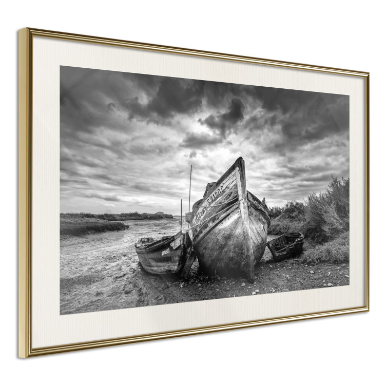 Wall Poster Journey into Nature - black and white abandoned boat against sky and clouds 138720 additionalImage 4