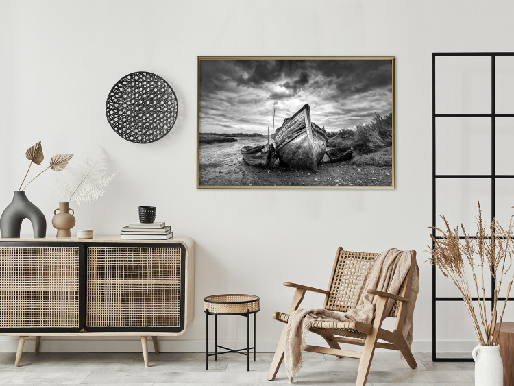 Wall Poster Journey into Nature - black and white abandoned boat against sky and clouds 138720 additionalImage 5