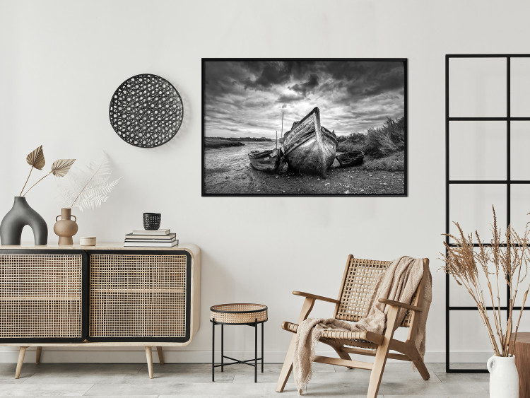 Wall Poster Journey into Nature - black and white abandoned boat against sky and clouds 138720 additionalImage 22