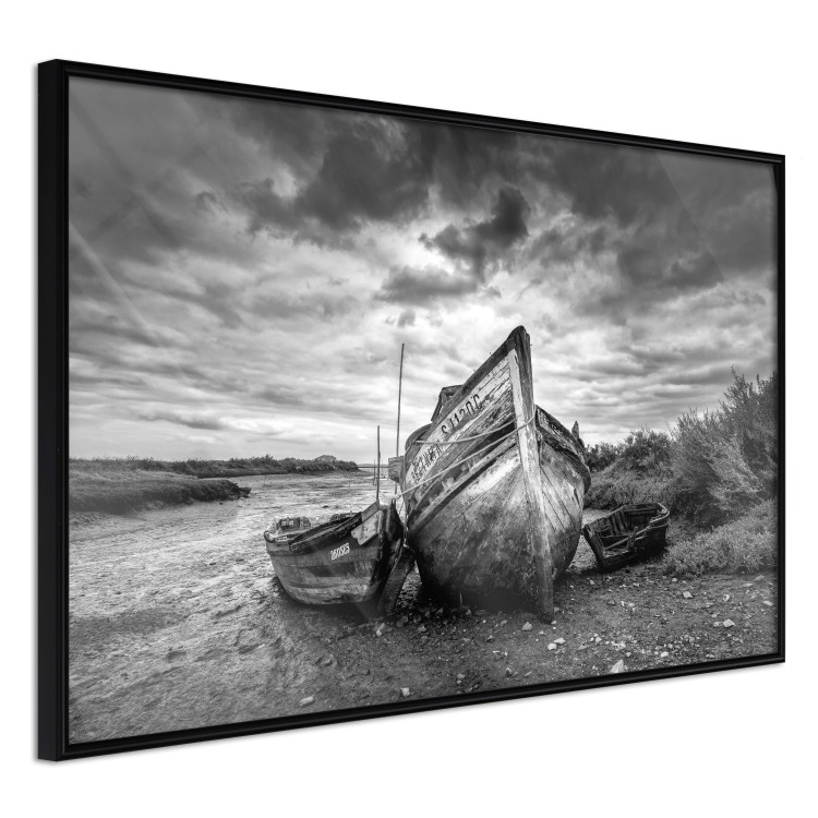 Wall Poster Journey into Nature - black and white abandoned boat against sky and clouds 138720 additionalImage 10