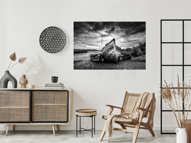Wall Poster Journey into Nature - black and white abandoned boat against sky and clouds 138720 additionalImage 8