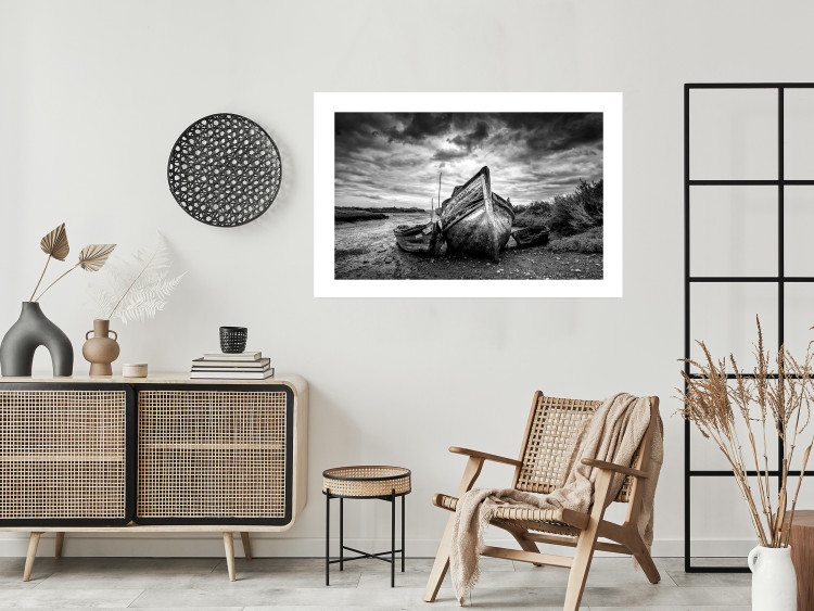 Wall Poster Journey into Nature - black and white abandoned boat against sky and clouds 138720 additionalImage 5