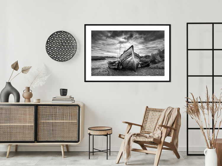 Wall Poster Journey into Nature - black and white abandoned boat against sky and clouds 138720 additionalImage 15