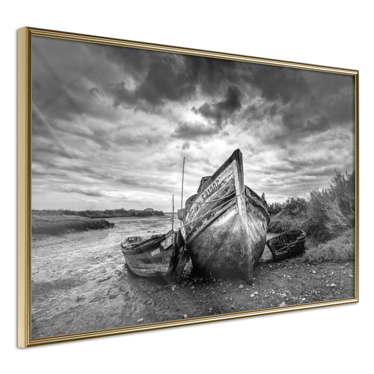 Wall Poster Journey into Nature - black and white abandoned boat against sky and clouds 138720 additionalImage 3