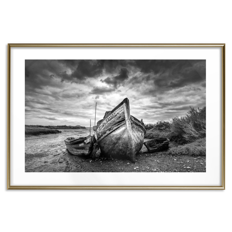 Wall Poster Journey into Nature - black and white abandoned boat against sky and clouds 138720 additionalImage 16