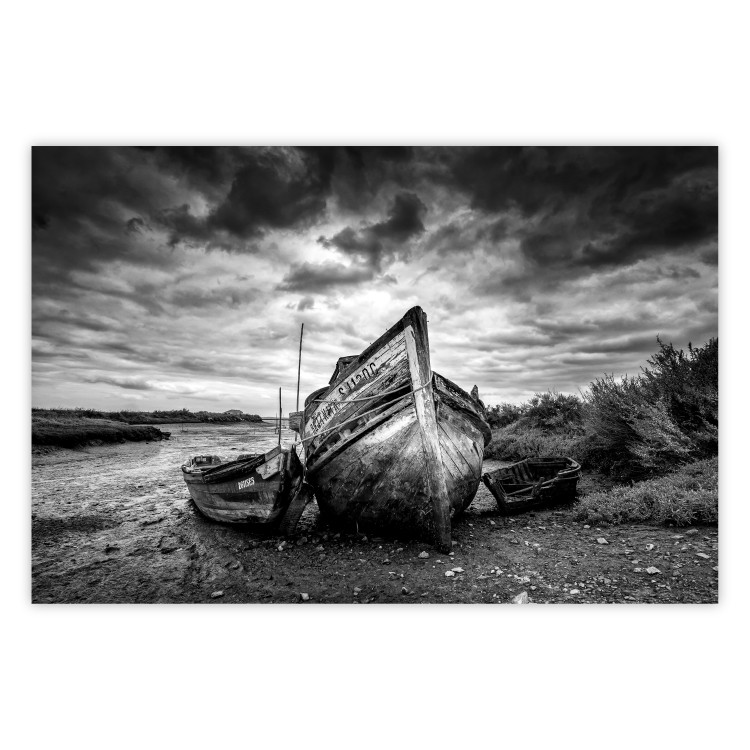 Wall Poster Journey into Nature - black and white abandoned boat against sky and clouds 138720