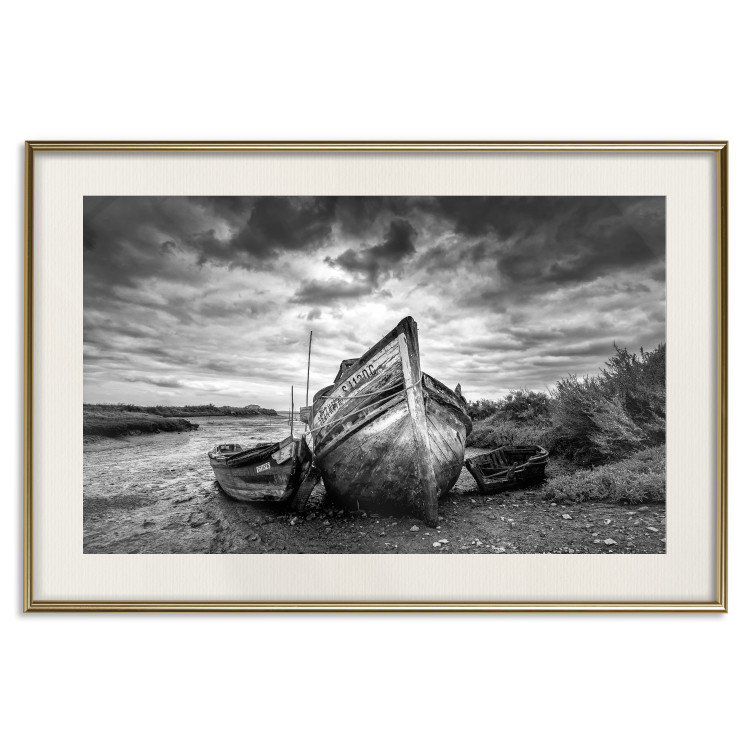Wall Poster Journey into Nature - black and white abandoned boat against sky and clouds 138720 additionalImage 17