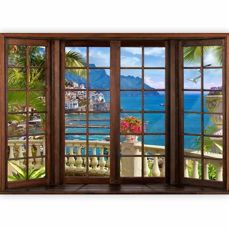 Wall Mural Paradise landscape - view from a window of the sea and a seaside village on a rock 92630 additionalImage 1