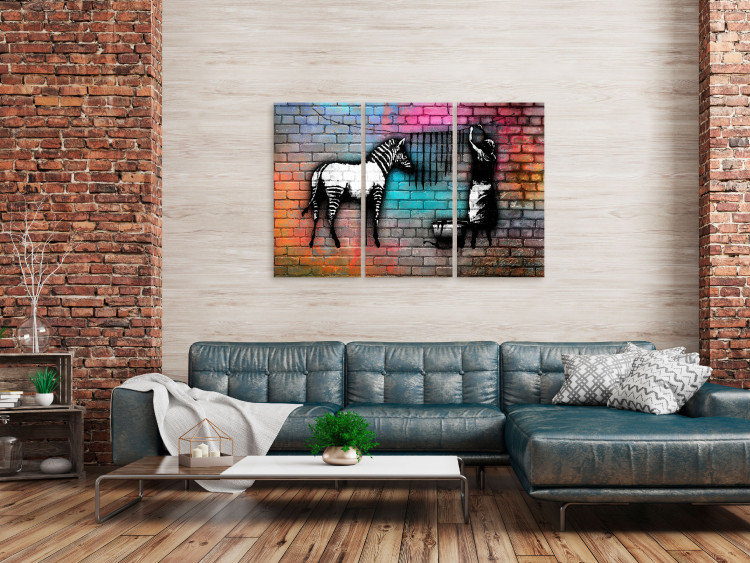 Canvas Print Zebra washing - street art graphics on an abstract, colorful brick 118540 additionalImage 3