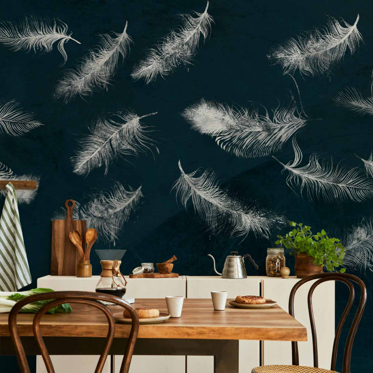Wall Mural In flight - white feathers carried by the wind on a dark blue background with pattern 142640 additionalImage 6