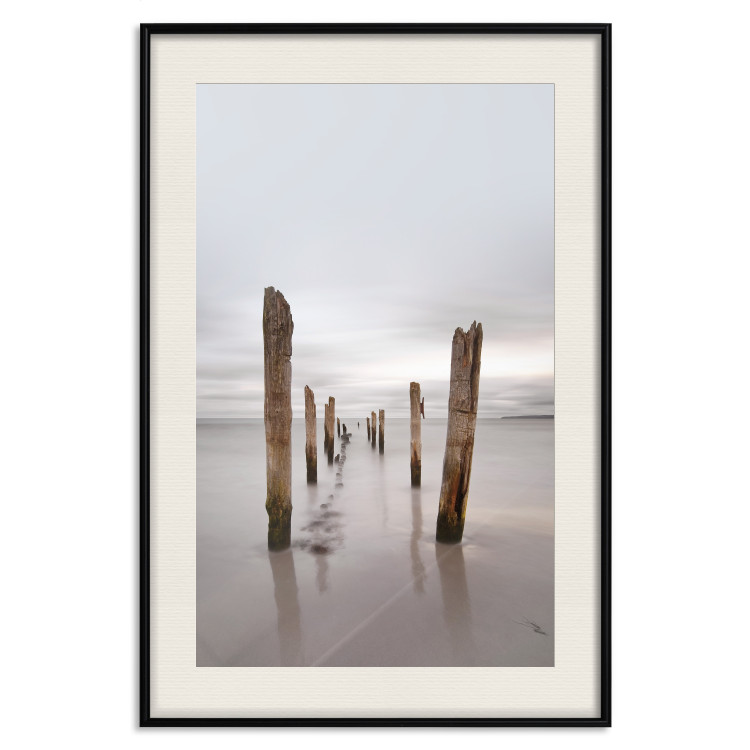 Poster Illusory Calm - seascape with wooden posts against the sky 130270 additionalImage 19