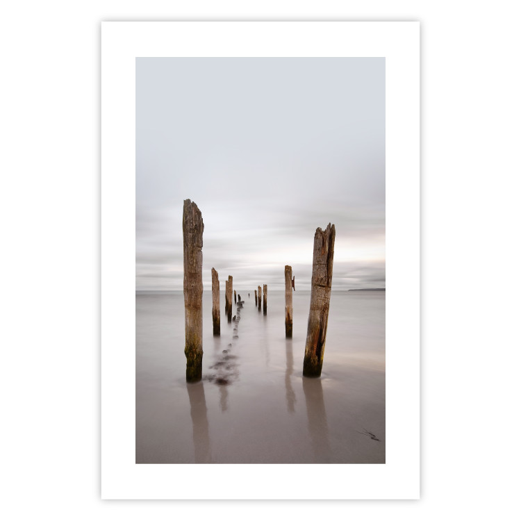 Poster Illusory Calm - seascape with wooden posts against the sky 130270 additionalImage 25