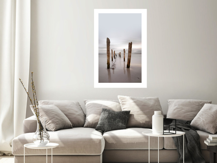 Poster Illusory Calm - seascape with wooden posts against the sky 130270 additionalImage 5