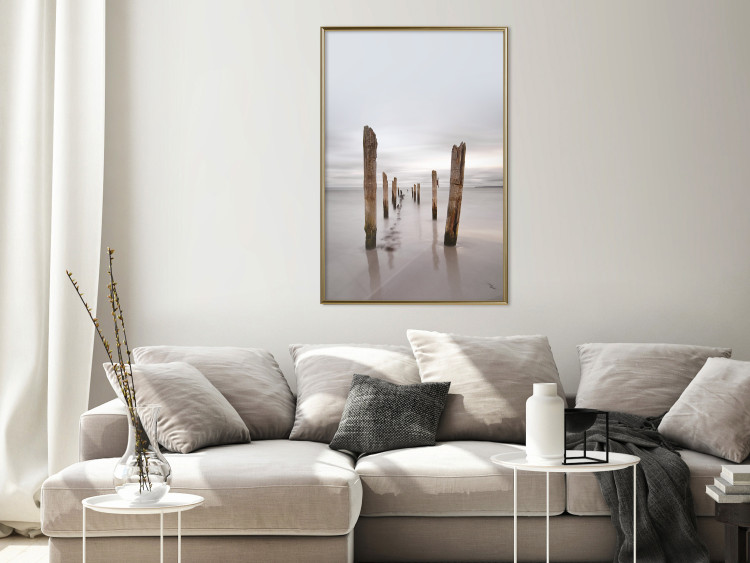 Poster Illusory Calm - seascape with wooden posts against the sky 130270 additionalImage 5