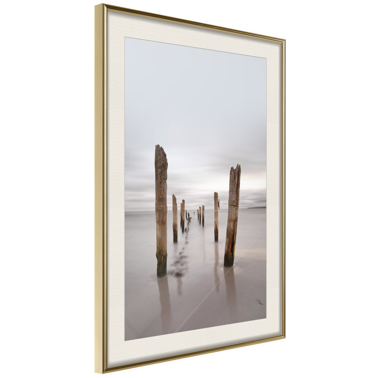 Poster Illusory Calm - seascape with wooden posts against the sky 130270 additionalImage 3