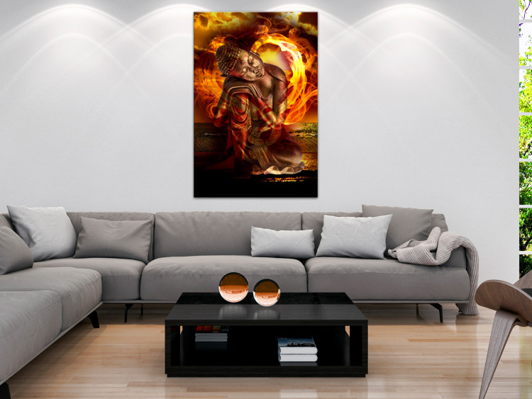 Canvas Art Print Sleeping statuette Buddha - Composition with fire in the background 135970 additionalImage 3