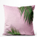 Decorative Velor Pillow Touch of palm trees - a minimal floral composition on a pink background 147070