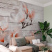 Wall Mural Delicacy of magnolia - orange and white flower against white boards 62470