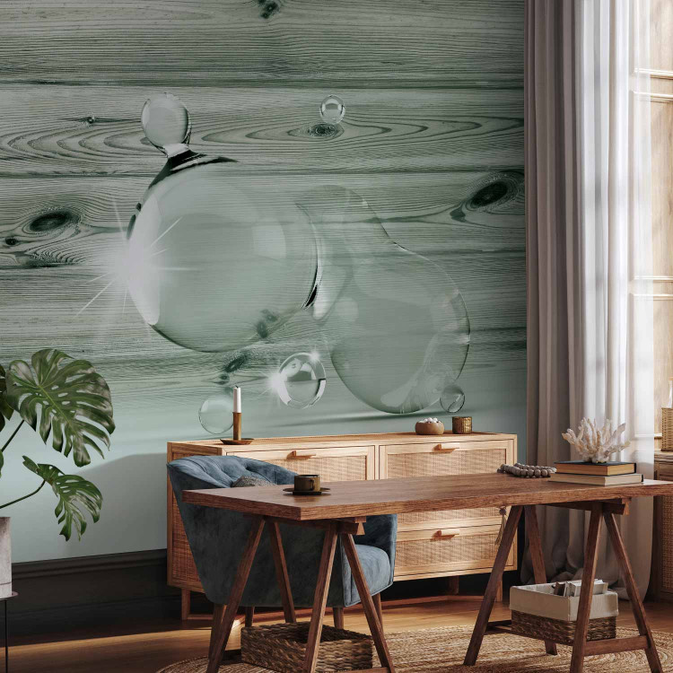 Photo Wallpaper Spilled Water - water droplet with shimmer and design on gray wood 61980 additionalImage 4
