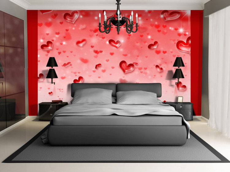 Wall Mural Love charm - abstract with red hearts motif on pink background 96880