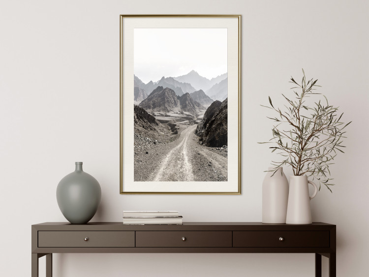 Poster Trail Through Mountains - landscape of a road and rocky mountains against a clear sky 130390 additionalImage 22