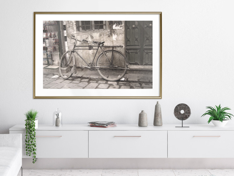Poster Two-Wheeler - urban scene of a stone street with a vintage-style bicycle 116701 additionalImage 15