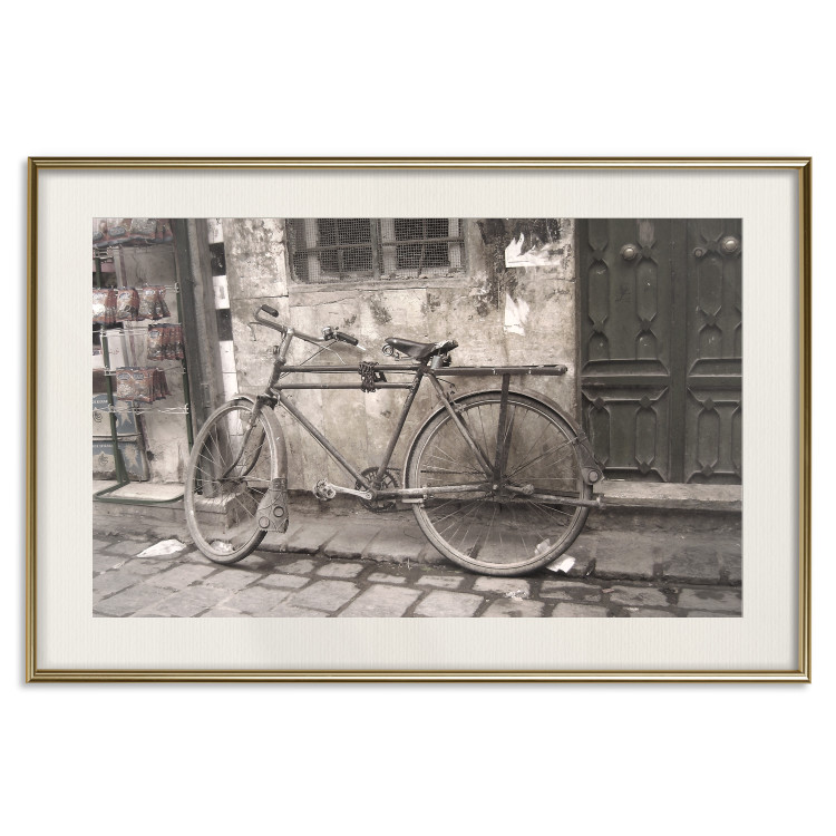 Poster Two-Wheeler - urban scene of a stone street with a vintage-style bicycle 116701 additionalImage 19