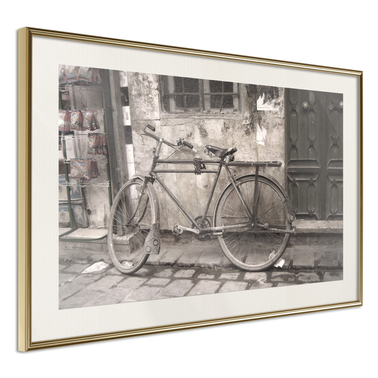 Poster Two-Wheeler - urban scene of a stone street with a vintage-style bicycle 116701 additionalImage 2