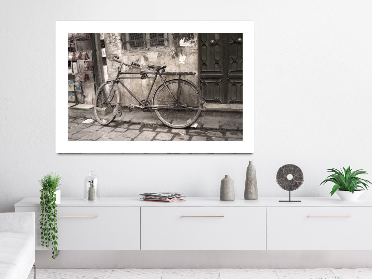 Poster Two-Wheeler - urban scene of a stone street with a vintage-style bicycle 116701 additionalImage 4