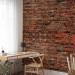 Wall Mural Red like a brick - solid pattern in red brick wall motif 106841