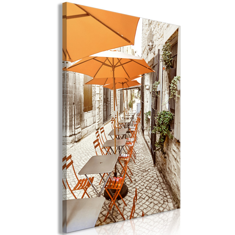 Canvas Print Italian Cafe - a photo of a narrow streets with tables and umbrellas 135841 additionalImage 2