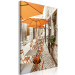 Canvas Print Italian Cafe - a photo of a narrow streets with tables and umbrellas 135841 additionalThumb 2