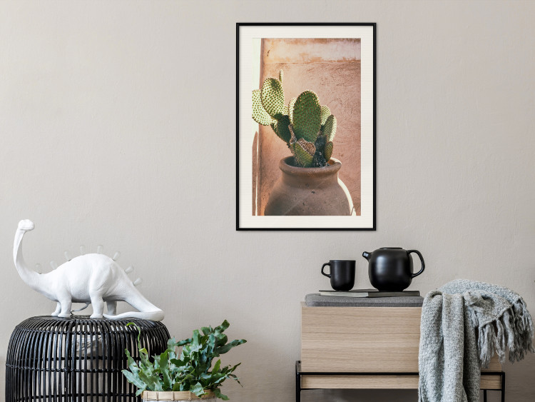 Poster Cactus in a Pot - succulent in a pot against the bright sunlight 134751 additionalImage 24