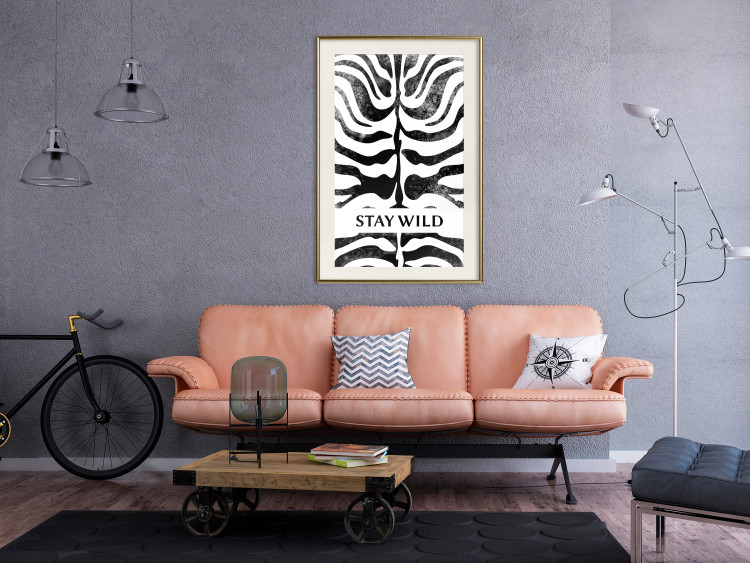 Wall Poster Stay Wild - English inscriptions on a black-and-white zebra background 127061 additionalImage 24