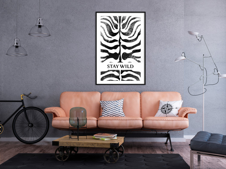 Wall Poster Stay Wild - English inscriptions on a black-and-white zebra background 127061 additionalImage 19