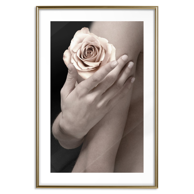Wall Poster Subtle Fragrance - woman's hand holding rose flower on black background 128081 additionalImage 14