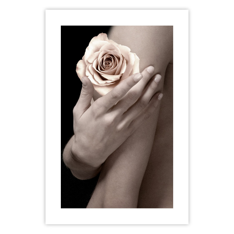 Wall Poster Subtle Fragrance - woman's hand holding rose flower on black background 128081 additionalImage 25