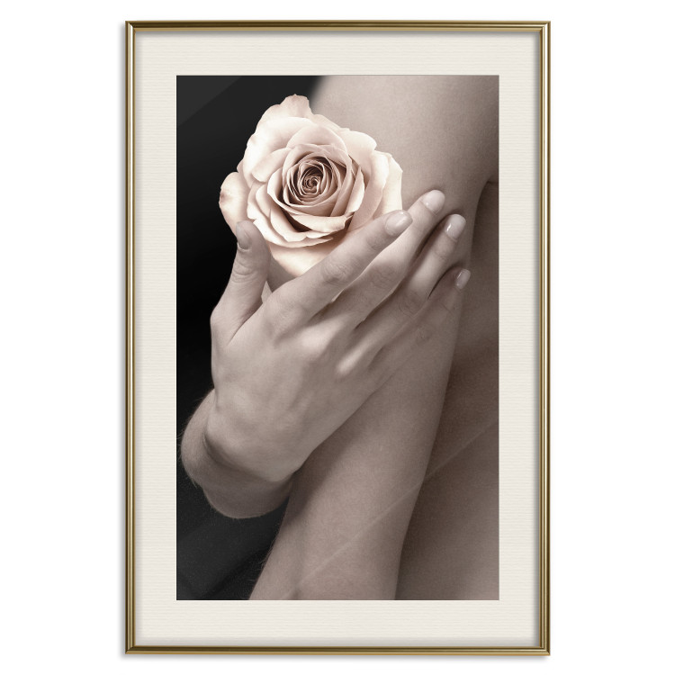 Wall Poster Subtle Fragrance - woman's hand holding rose flower on black background 128081 additionalImage 20