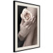 Wall Poster Subtle Fragrance - woman's hand holding rose flower on black background 128081 additionalThumb 2