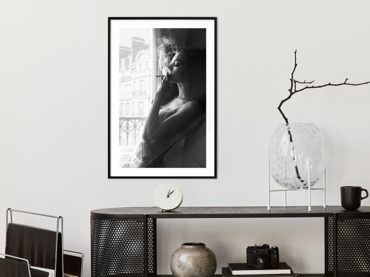 Wall Poster Blissful Moment - black and white photograph of a woman smoking a cigarette 132281 additionalImage 23