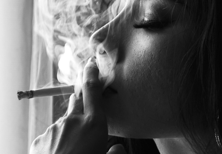 Wall Poster Blissful Moment - black and white photograph of a woman smoking a cigarette 132281 additionalImage 10