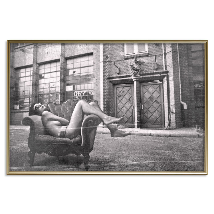 Wall Poster Casual Pose - black and white landscape of a woman in a chair with a building in the background 134181 additionalImage 17