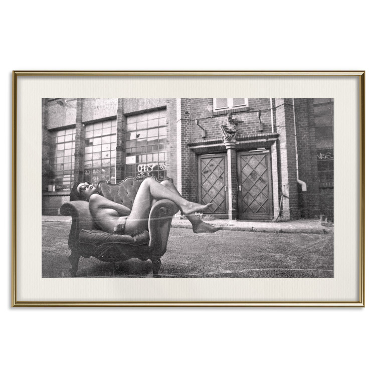 Wall Poster Casual Pose - black and white landscape of a woman in a chair with a building in the background 134181 additionalImage 20
