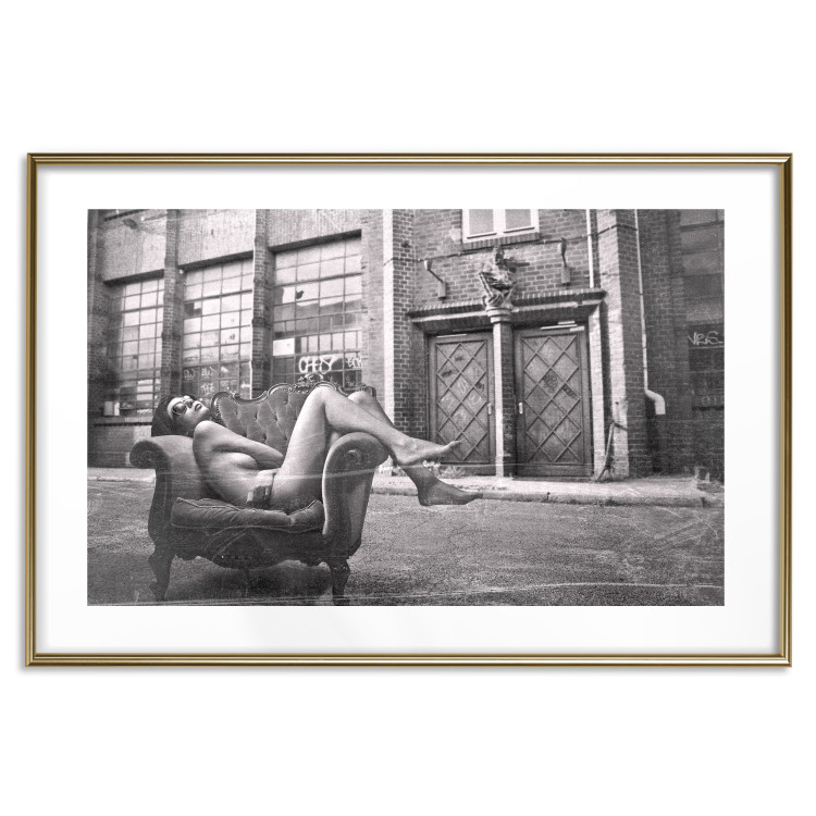 Wall Poster Casual Pose - black and white landscape of a woman in a chair with a building in the background 134181 additionalImage 16