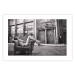 Wall Poster Casual Pose - black and white landscape of a woman in a chair with a building in the background 134181 additionalThumb 25