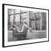 Wall Poster Casual Pose - black and white landscape of a woman in a chair with a building in the background 134181 additionalThumb 14