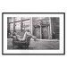 Wall Poster Casual Pose - black and white landscape of a woman in a chair with a building in the background 134181 additionalThumb 17